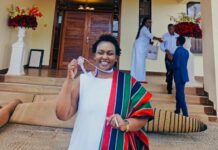 Edinah Kangwana MBS, MHC, showcasing her Heroes Award medal conferred to her by President William Ruto during the 60th Mashujaa Day celebrations at Kericho County on October 20, 2023. She was honored under the Human Rights category. PHOTO/Courtesy.