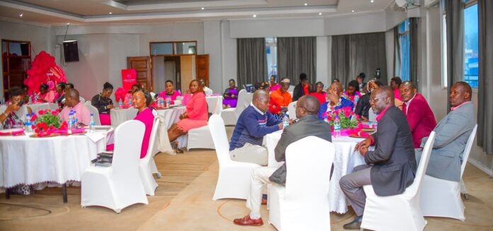 Participants follow proceedings during a Heels and Pink high tea event and round-table conversation by Arise Circle KE in honor of Breast Cancer Awareness Month 2023, on October 28, 2023. PHOTO/Mzii Photography Kenya.