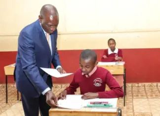 Of National Examinations: The end of an era October 30, 2023, at Kikuyu Township Primary School, Kiambu County. President William Ruto issuing exam papers to candidates during the official start of the KCPE and KPSEA National Examinations. The KCPE exams and the 8-4-4 system have come to an end, with KPSEA taking over with earnest. PHOTO/X (@WilliamsRuto)