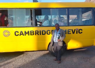 Cambridge Mevic School: Cultivating excellence through collaboration Joseph Charles, the Board of Management Chairperson, Cambridge Mevic School, poses for a photo as the other staff get ready for a ride after a consultative meeting on February 10, 2024. PHOTO/Bonface Otieno, Scholar Media Africa.