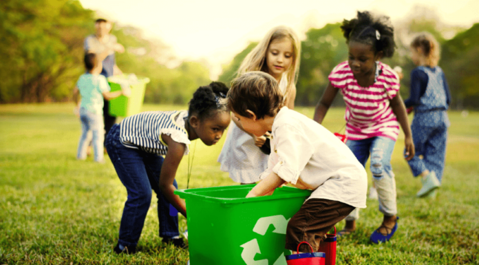 Divine Ecology: Exploring theistic perspectives on environmental stewardship Children collecting litter in a field. Environmental conservation is for everybody. PHOTO/RB.